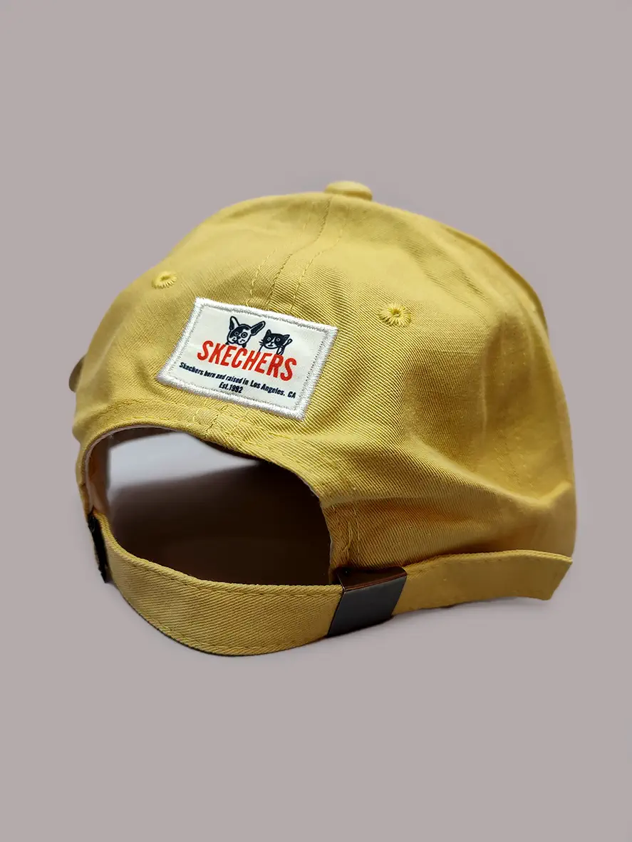 کلاه بیسبالی اسکچرز طرح گربه رنگ زرد